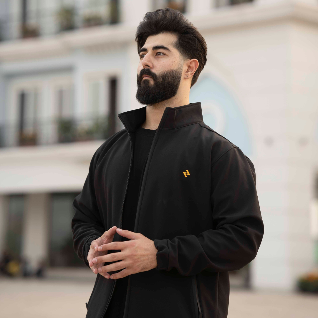 Male Model wearing a CL SS Jacket Black _ Side View