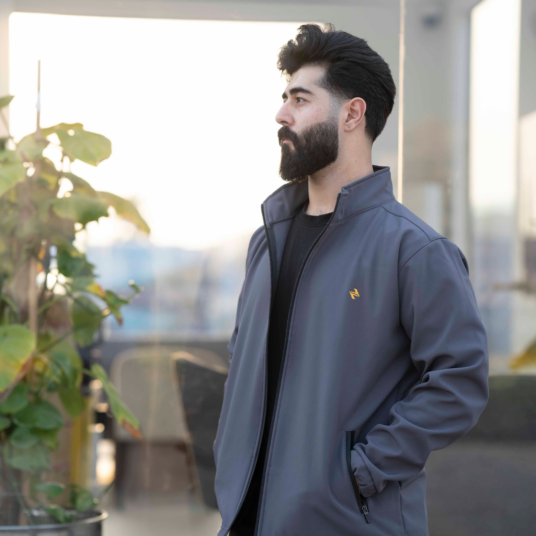 Male Model wearing a CL SS Jacket Grey _ Side View