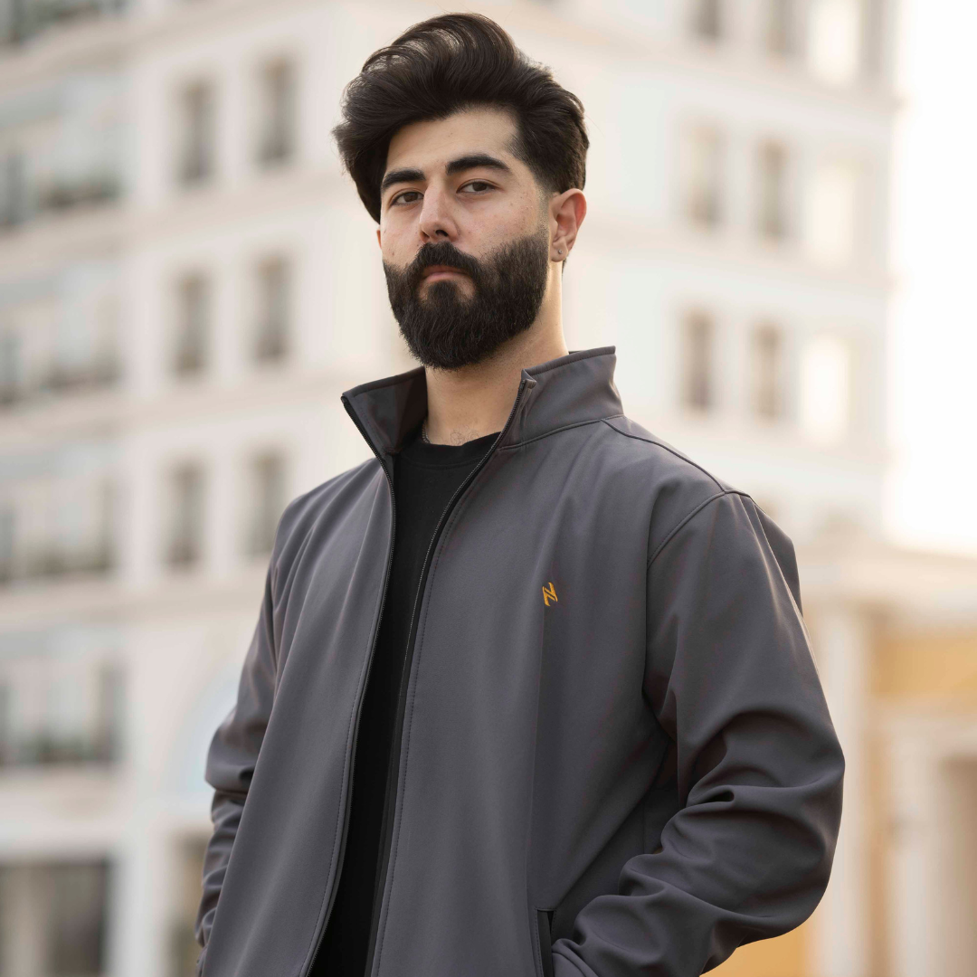 Male Model wearing a CL SS Jacket Grey _ Side View